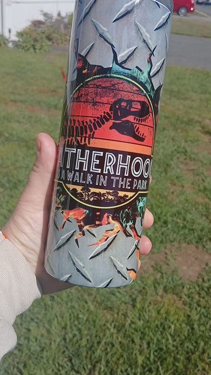 Fatherhood is a walk in the park 20 oz tumbler